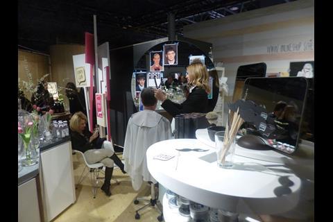 Schweitzer's Dept Store 3.0 stand composed of a two-floor shop with everything from clothing to food by way of a restaurant and hairdresser